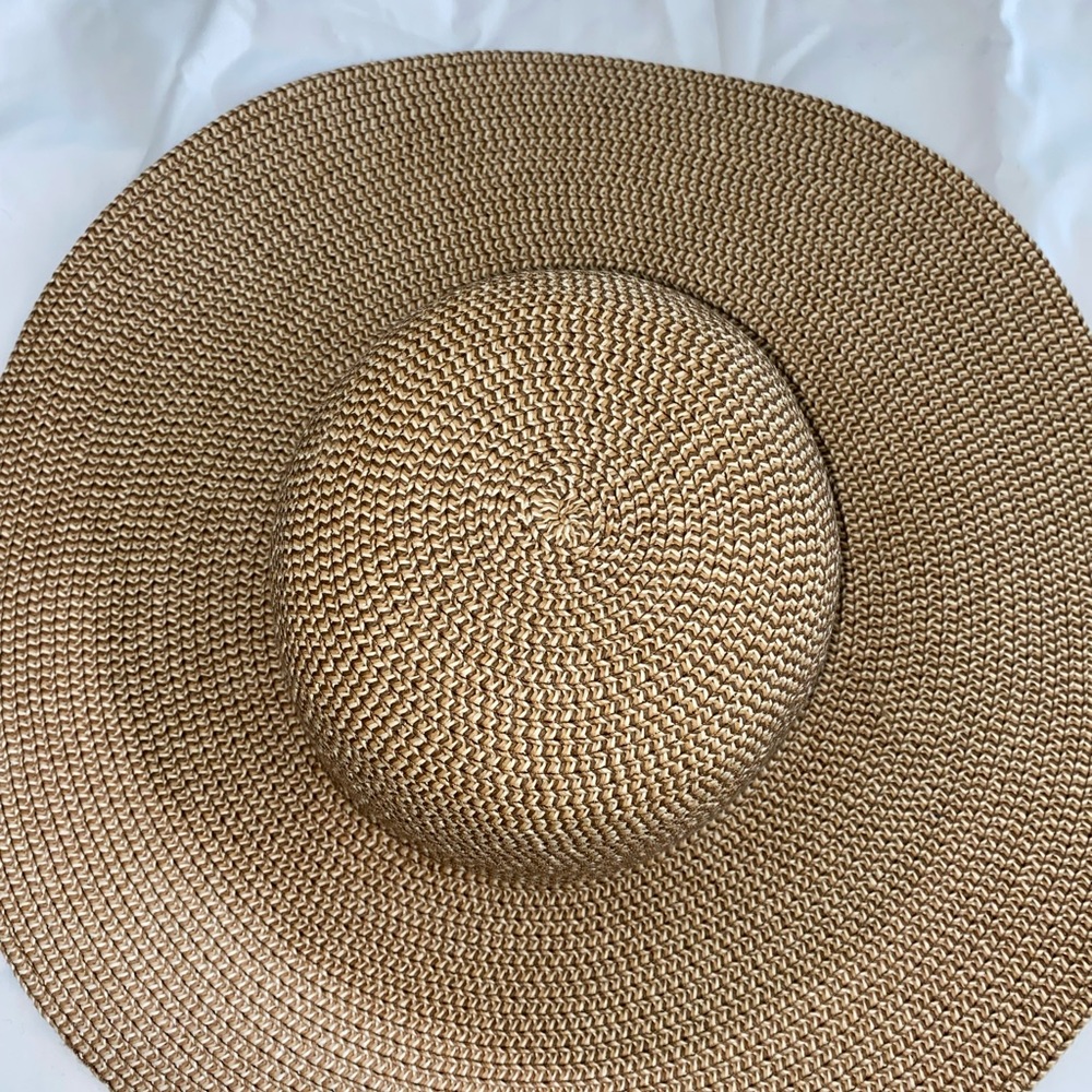 Dark brown straw beach hat. One size fits all